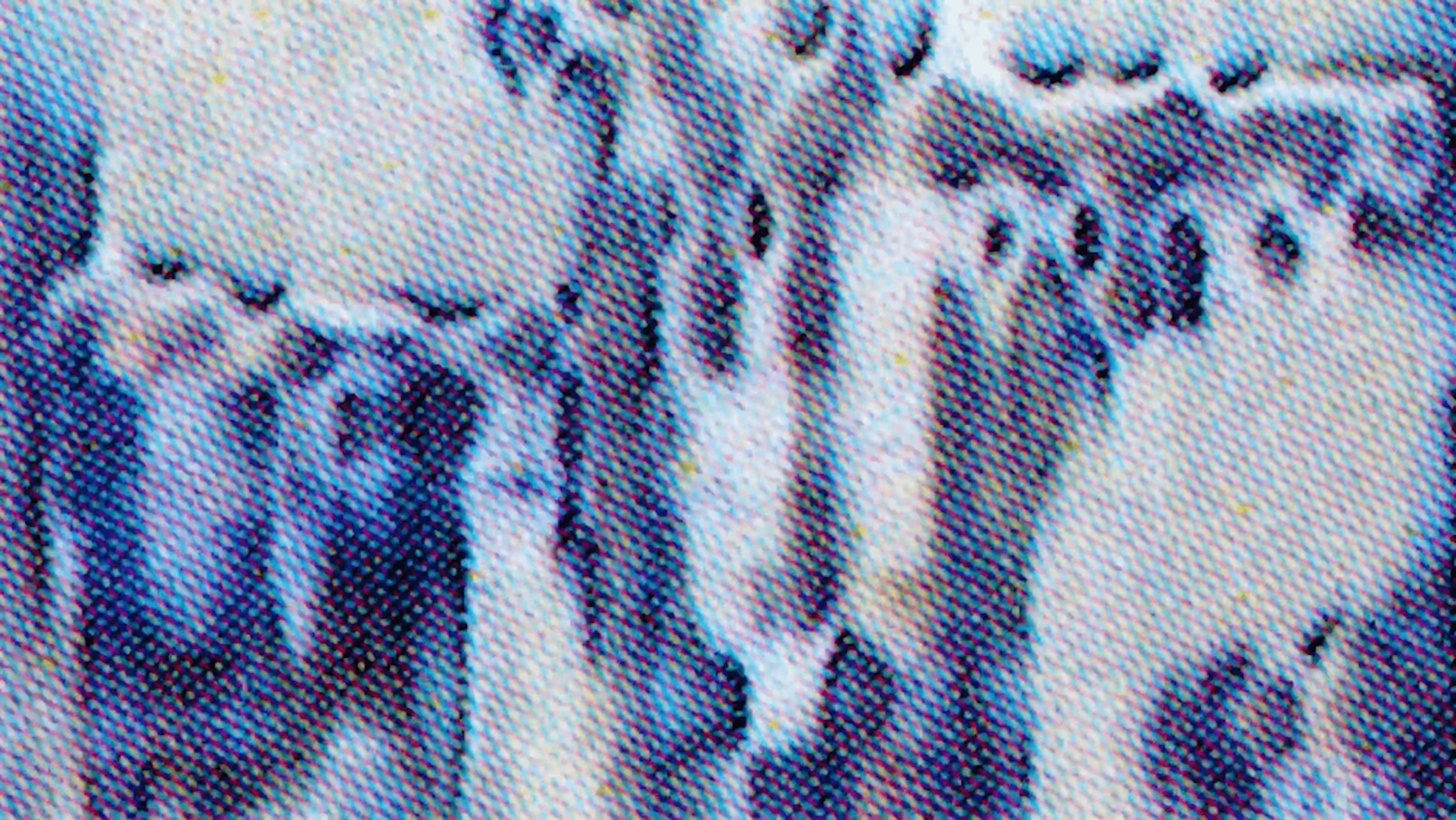 film still showing an abstract watercolour- like image with white a blue colours 